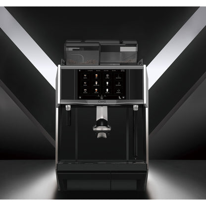 Caye Smart X Black coffee machine with digital display on a dark background