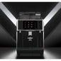 Caye Smart X Black coffee machine with digital display on a dark background