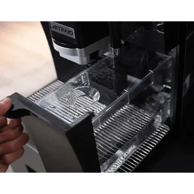 JL32 Espresso machine with a clear container holding coffee grounds. - Sip N Smile